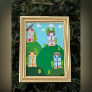 Colorful Framed Artwork with Houses